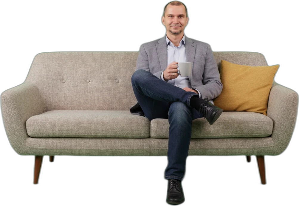 Andrei on the couch, coffee in hand — the kettle’s on.
