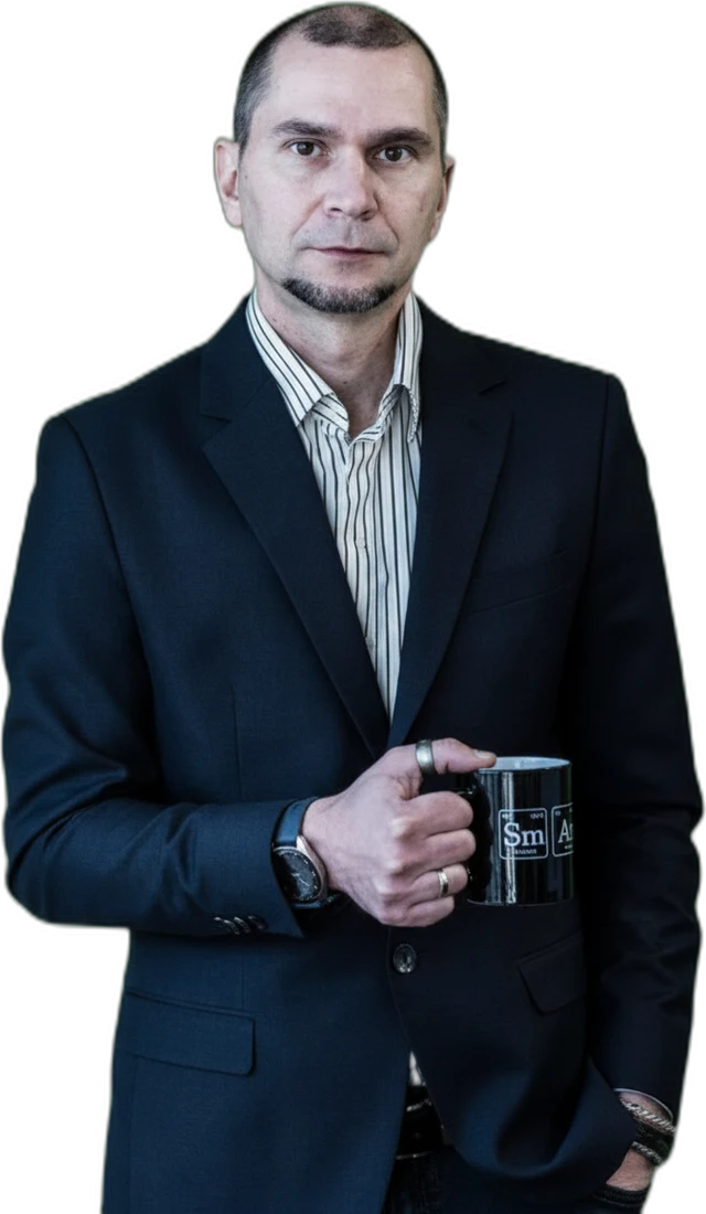 Andrei Migatchev, mug of coffee in hand — as usual.